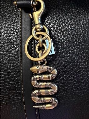 Coach Snake charm Bnwt